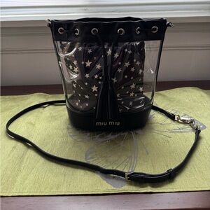 💯 authentic Miu Miu Clear Bucket Bag with Black Leather & Star Print